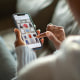 Woman purchasing clothes on a mobile app